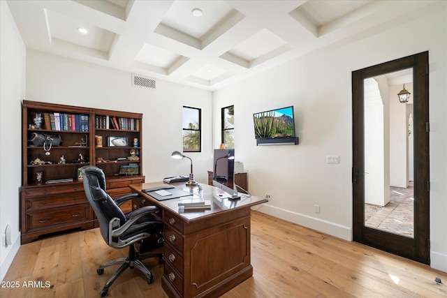 home office featuring coffered ceiling, light wood-type flooring, visible vents, and baseboards