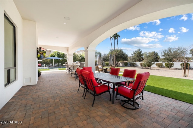 view of patio featuring outdoor dining area