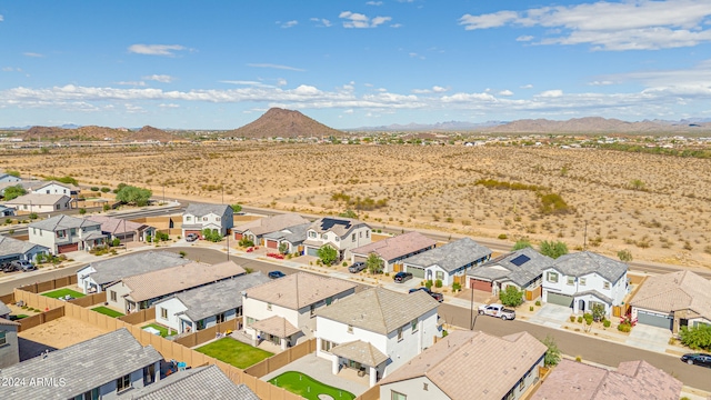 birds eye view of property featuring a mountain view