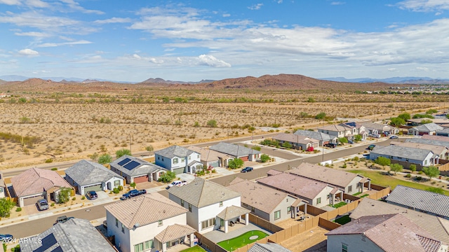 birds eye view of property featuring a mountain view