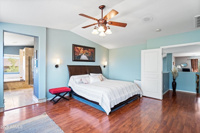 bedroom with wood finished floors, visible vents, baseboards, lofted ceiling, and ceiling fan