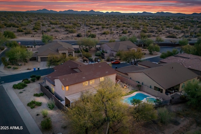 bird's eye view featuring a residential view and a mountain view