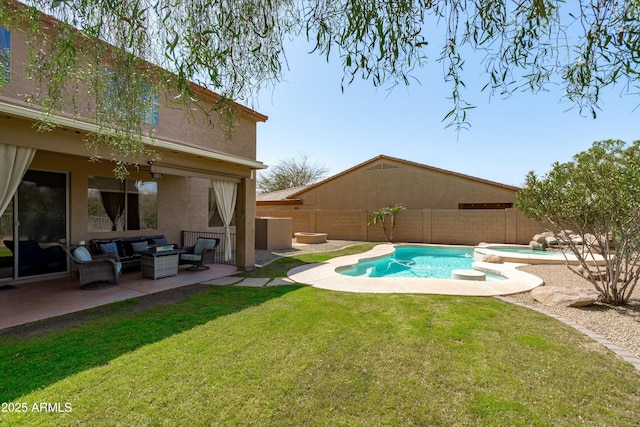 view of swimming pool featuring a lawn, a pool with connected hot tub, an outdoor living space, a fenced backyard, and a patio area