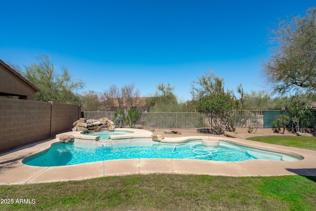 view of swimming pool with a fenced in pool, an in ground hot tub, and a fenced backyard