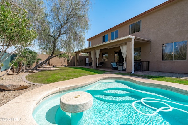 view of swimming pool with a fenced in pool, a patio, and a fenced backyard