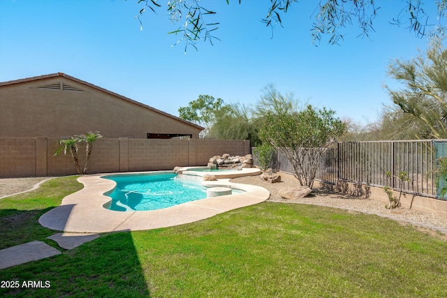 view of swimming pool with a pool with connected hot tub, a lawn, and a fenced backyard