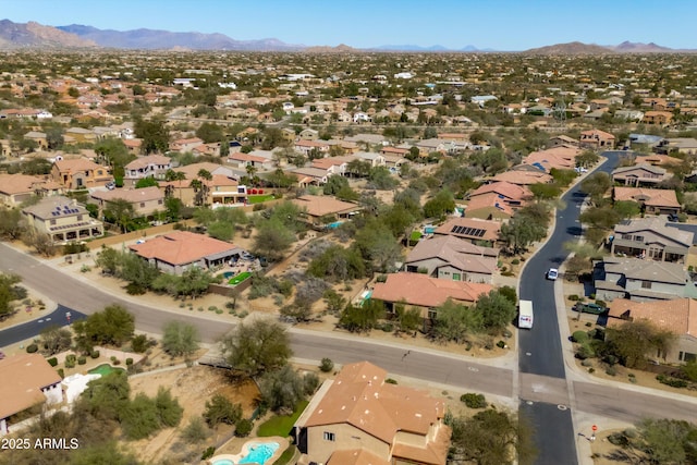 aerial view with a mountain view and a residential view