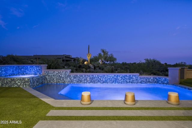 view of pool featuring an infinity pool