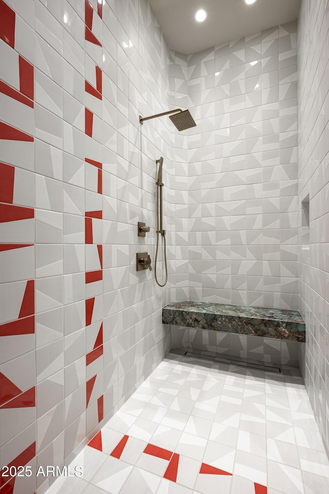 full bathroom with tiled shower