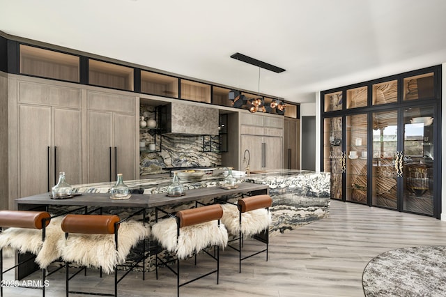 dining area with light wood-type flooring