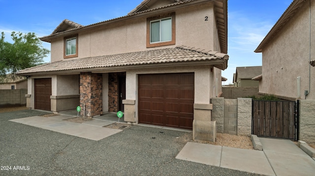 view of front of home with a garage