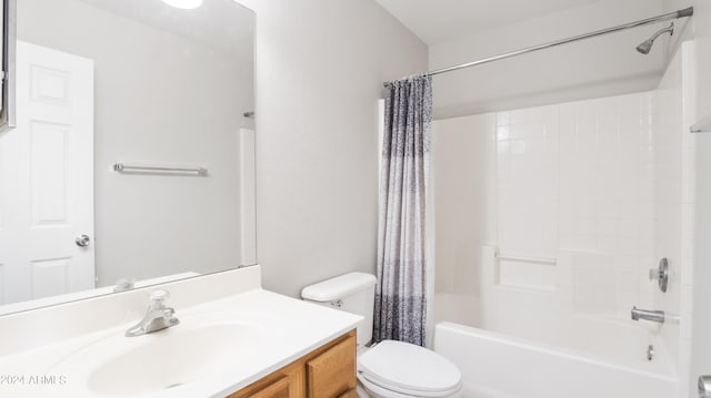 full bathroom with shower / bathtub combination with curtain, vanity, and toilet