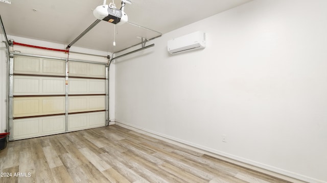 garage with a wall mounted AC and a garage door opener