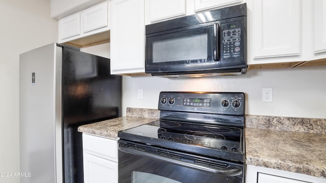 kitchen with white cabinetry and black appliances