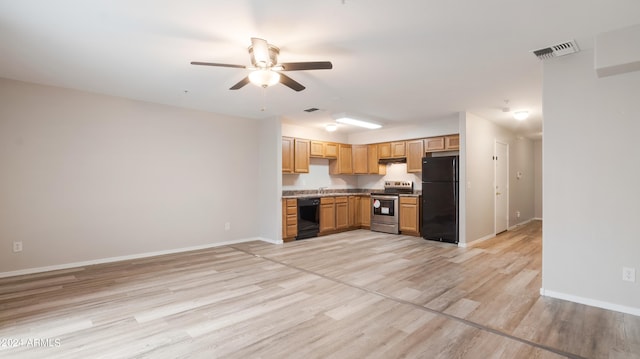 kitchen featuring black appliances, ceiling fan, and light hardwood / wood-style flooring