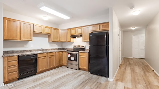 kitchen featuring black appliances, sink, and light hardwood / wood-style floors