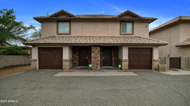 view of front of house with a garage