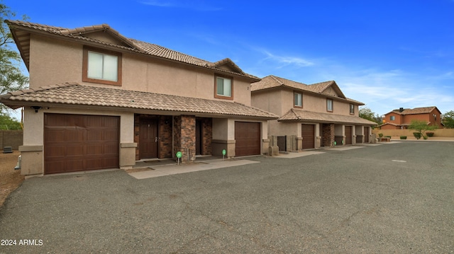 view of front of home with a garage