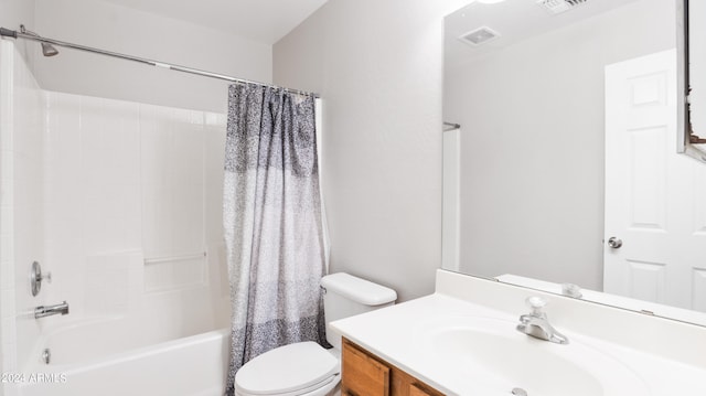 full bathroom featuring shower / bathtub combination with curtain, toilet, and vanity