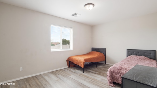 bedroom featuring light hardwood / wood-style flooring