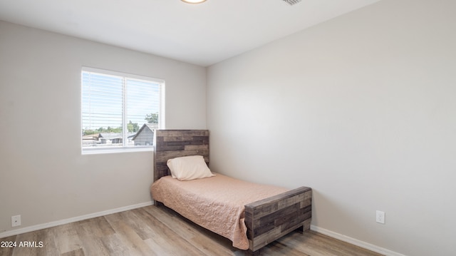 bedroom featuring light hardwood / wood-style flooring