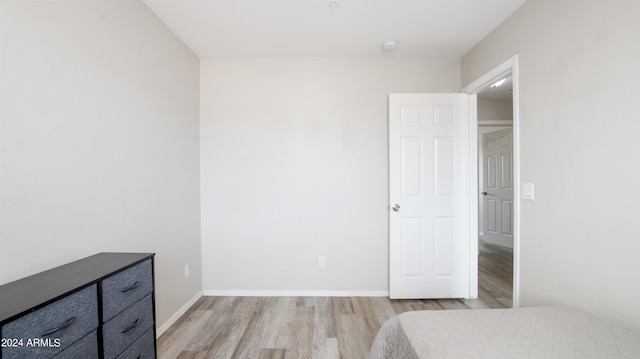 bedroom featuring light wood-type flooring