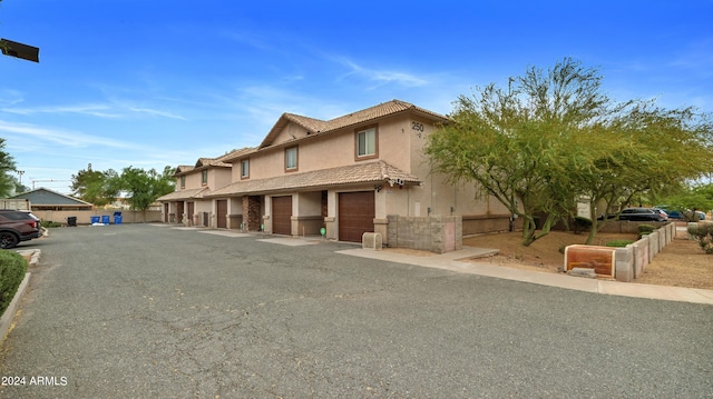 view of front of home with a garage