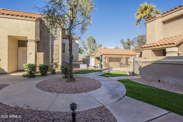 view of community featuring a patio area and fence