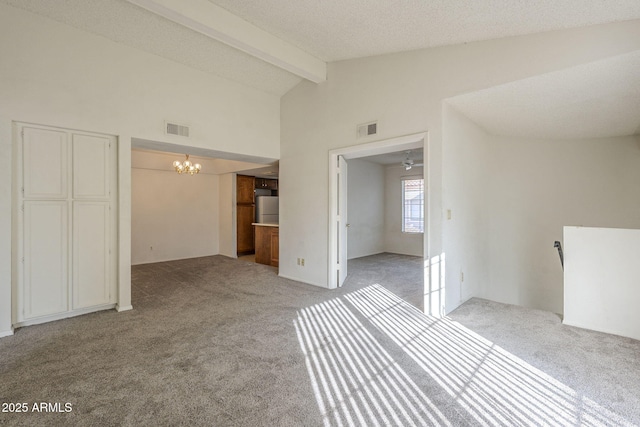 unfurnished bedroom featuring light carpet, lofted ceiling with beams, and visible vents