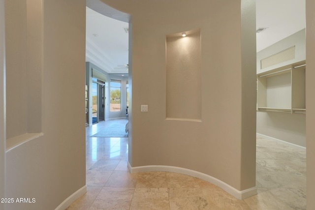 corridor with light tile patterned floors