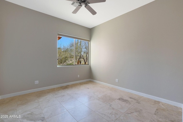 empty room featuring ceiling fan