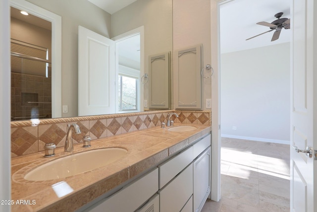 bathroom with backsplash, ceiling fan, tile patterned flooring, and vanity