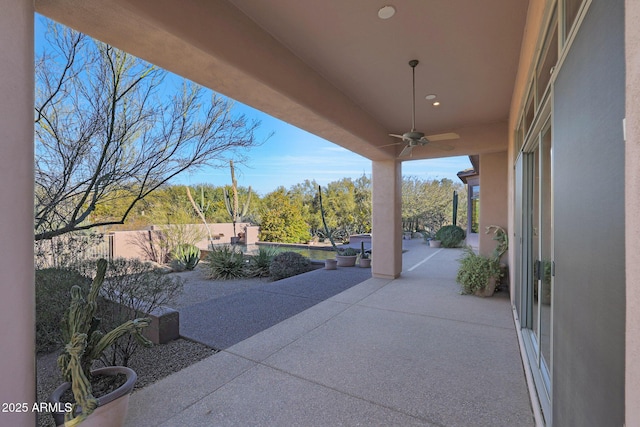 view of patio with ceiling fan