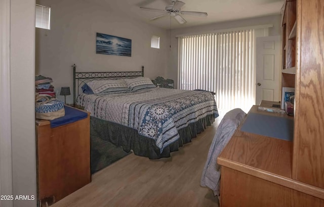 bedroom featuring wood finished floors and a ceiling fan