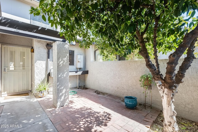 view of patio / terrace featuring fence