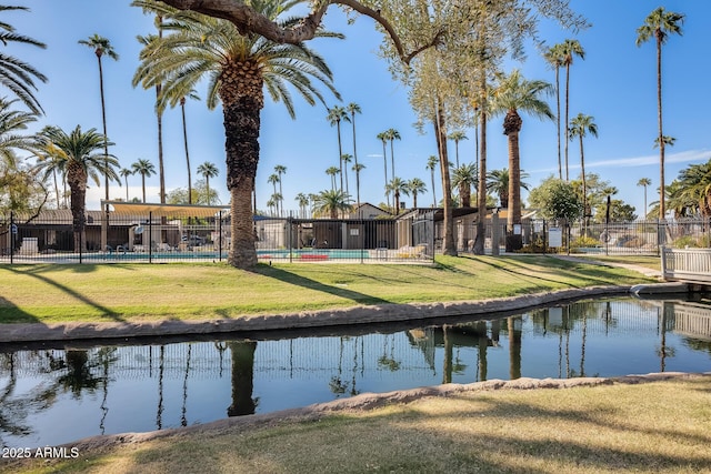 view of water feature with fence