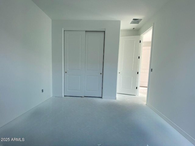 unfurnished bedroom featuring a closet