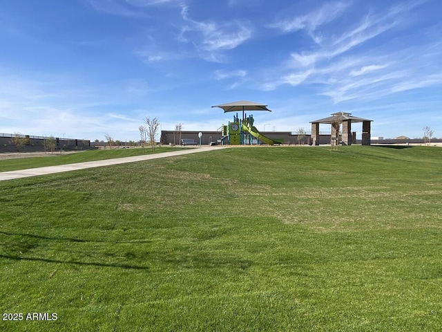 view of home's community featuring a gazebo, a yard, and a playground