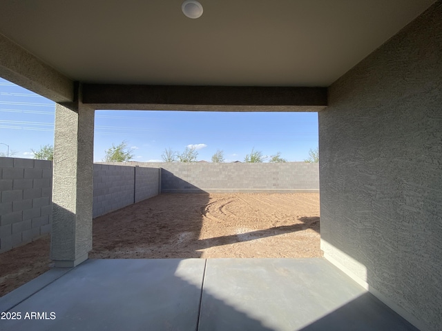 view of yard featuring a patio and a fenced backyard