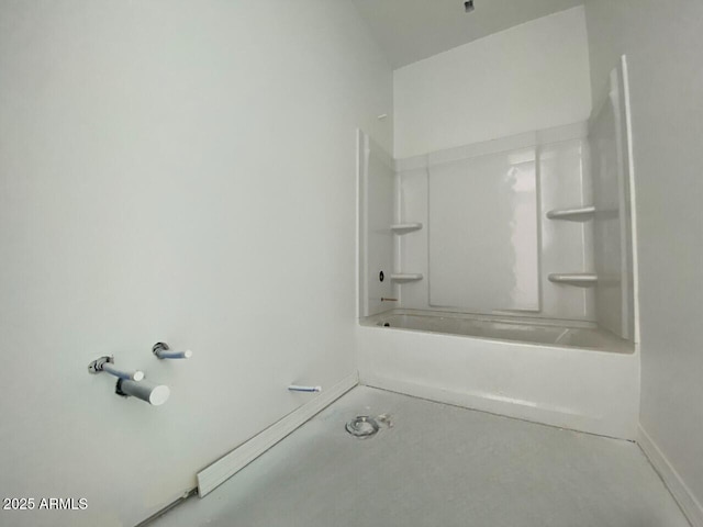 bathroom with shower / washtub combination