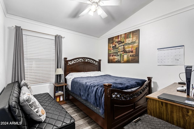 bedroom featuring ceiling fan, wood-type flooring, crown molding, and vaulted ceiling