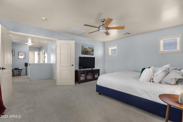 3863 S Posse Trl, Gilbert, AZ 85297 - bedroom featuring light colored carpet and a ceiling fan
