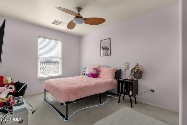 3863 S Posse Trl, Gilbert, AZ 85297 - carpeted bedroom with baseboards and ceiling fan