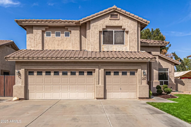 view of front facade with a garage, concrete driveway, fence, and stucco siding