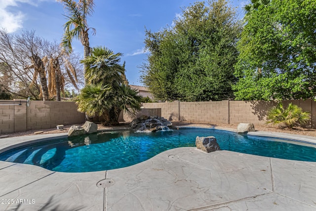 view of pool with a fenced in pool, a fenced backyard, and a patio