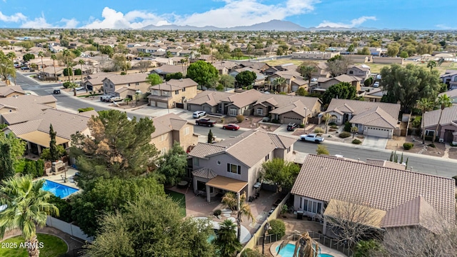 birds eye view of property featuring a mountain view and a residential view