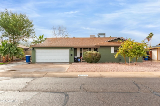 single story home with a garage