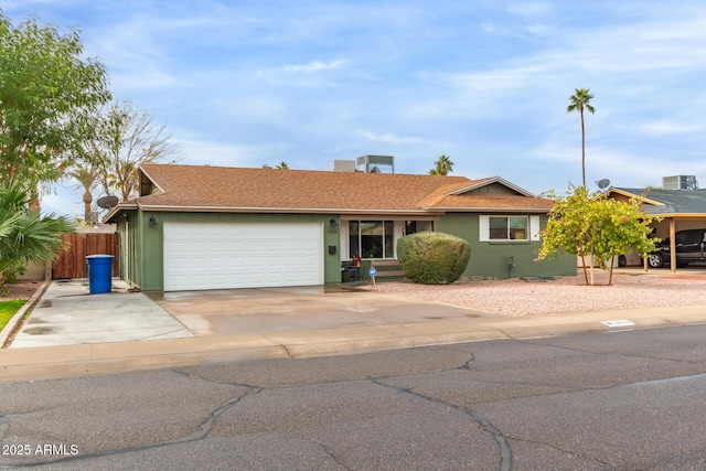 ranch-style house featuring a garage