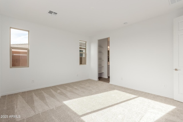 empty room with light carpet