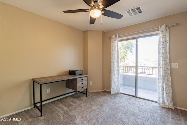 interior space featuring carpet floors and ceiling fan